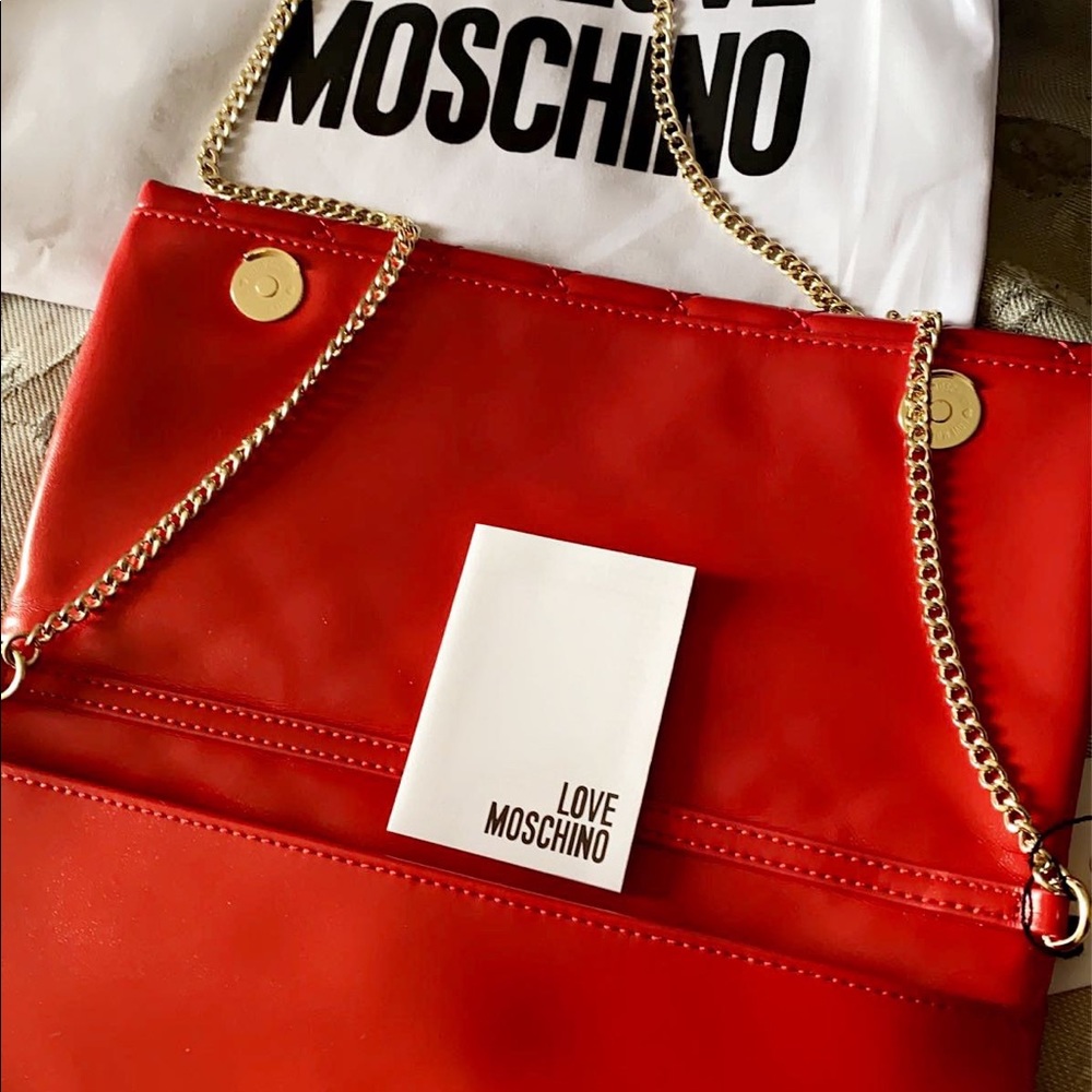 cross shoulder bag, new. never used .long gold chain.